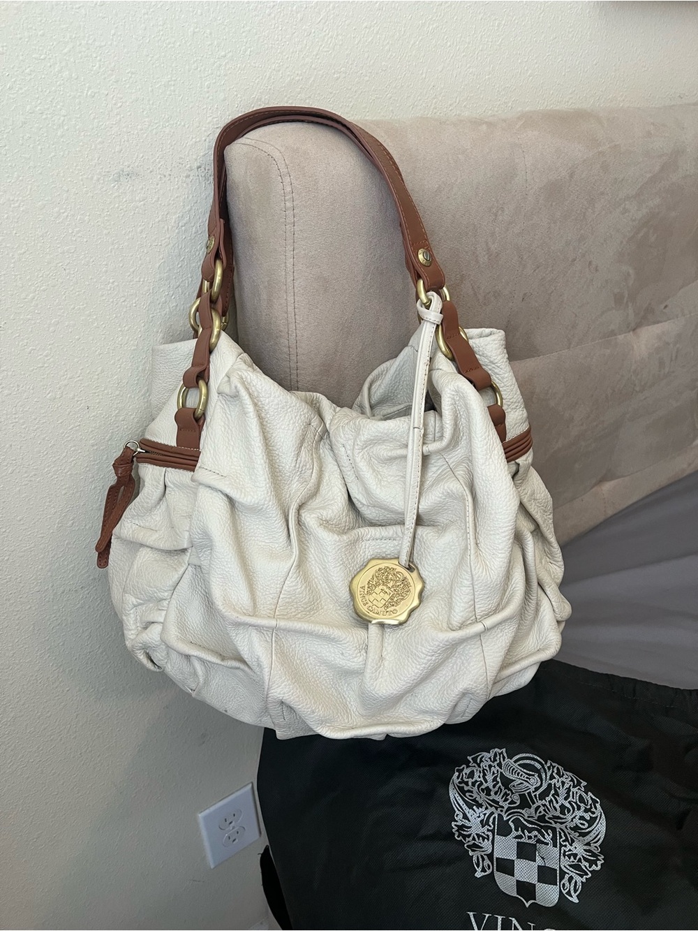 Vince Camuto Cream Shoulder Bag with Tan Handles and Gold Medallion